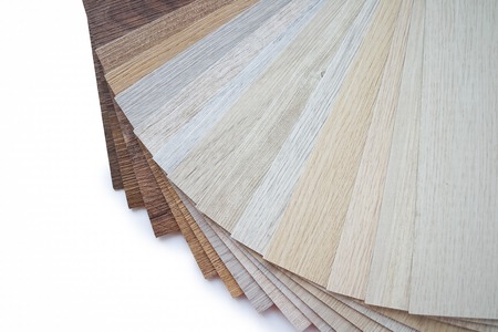 Samples of laminate make a new floor for renovate or new floor in the house or the building or commercial building on white backgroundの写真素材