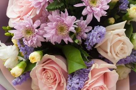 Bouqet flower background, different roses chrysanthemum lisianthusの写真素材