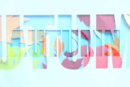 letter autumn cut from paper with paper autumn leaves. Form, counterform. Overlay, multiple...