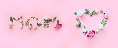 MOM letters made of different flowers on pink background. Long format for webの写真素材