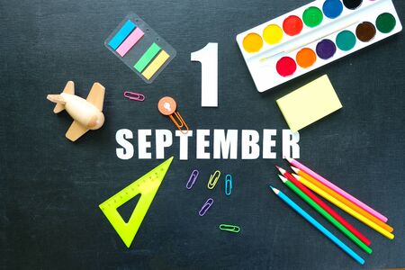 Back to school concept. Different stationery on blackboard background.の写真素材