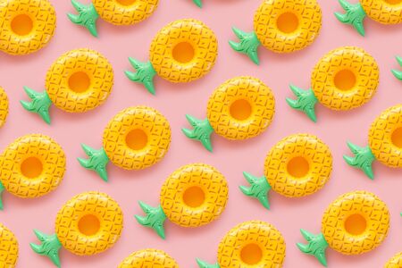 Seamless pattern with Inflatable penapples on a pink background.の写真素材