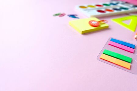Back to school concept. The various stationery on light pink background. Education