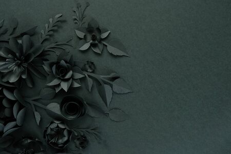 Black paper flowers on Black background. Cut from paper. Gothic frameの写真素材