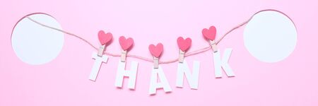 Thank letters on clothespins with hearts. Thank concept.の写真素材