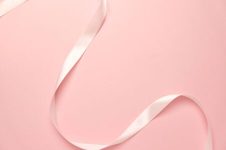 pink ribbon on pink backgroundの写真素材