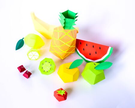 Penapple, banana, orange, apple, kiwi and watermelon cut from paper on white backgroundの写真素材