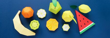 Exotic fruits made of paper on classic blue background. Vitamin conceptの写真素材