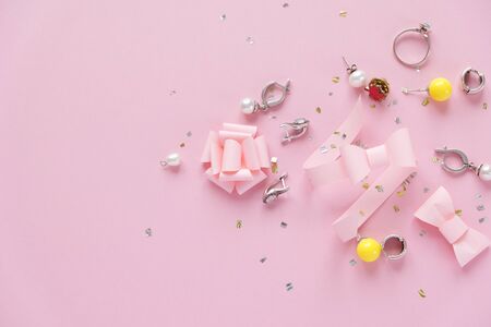 Female accessories on pink background. Female concept. Womens dayの写真素材