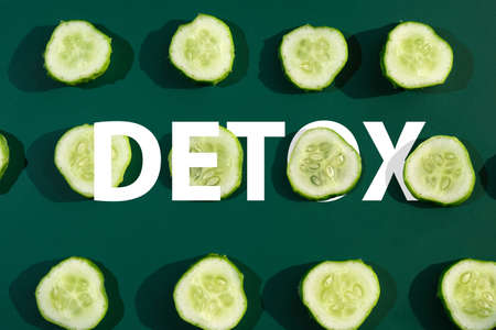 Detox cleanse drink concept, green vegetable smoothie ingredients. Natural, organic healthy juice in...