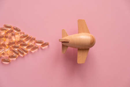 the plane is carrying fish oil capsulesの写真素材