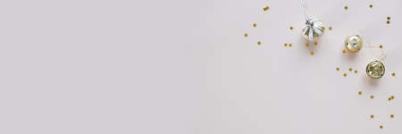 Christmas background with decorations and on pink background. Neutral color