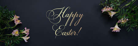 Black easter eggs with gold pattern and pink flowers