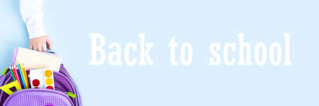 Back to school concept. Backpack with school supplies. Top view.の写真素材