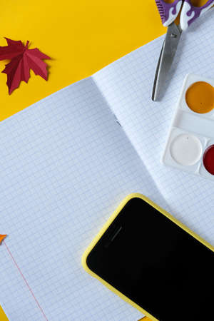 Back to school concept. Overhead shot of school supplies on yellow background. 1 septemberの写真素材