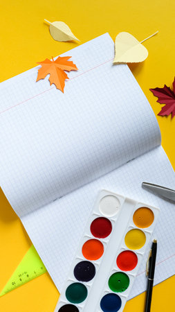 Back to school concept. Overhead shot of school supplies on yellow background. 1 septemberの写真素材