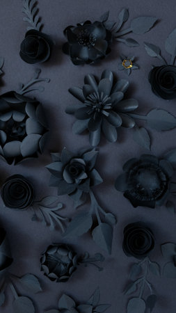 Black paper flowers on Black background. cut from paper. wallpaper templateの写真素材