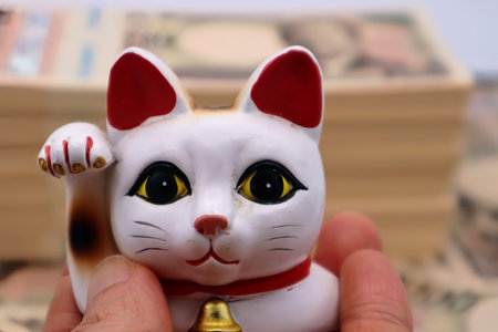 Close-up of a beckoning catの写真素材