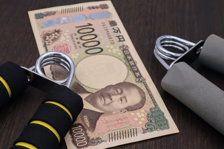 Hand grip and new Japanese 10,000 yen bill