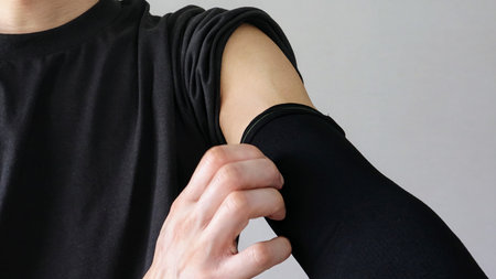A person scratching their skin through a supporter