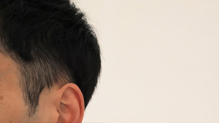 Close-up of a man with an undercut