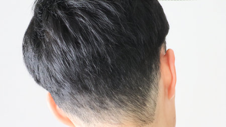 Back view of a Japanese man who just had his hair cut