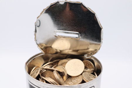 A large amount of 500 yen coins in a piggy bank