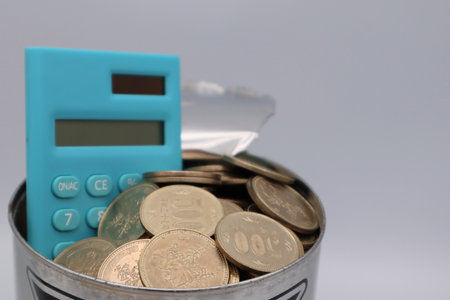 Calculator and piggy bank