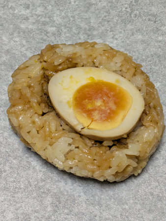 Rice ball with a boiled egg inside