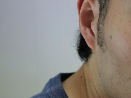 A man with long sideburns