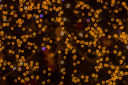 Lights on gold abstract bokeh for background.の写真素材