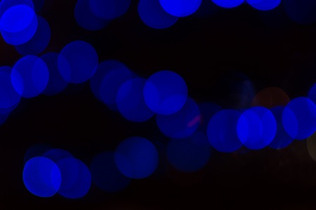 Lights on blue abstract bokeh for background.