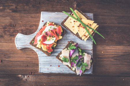 Smorrebrod - danish open sandwich with fish, herrin.の写真素材