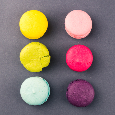 Colourful french macaroons on the grey backgroundの写真素材