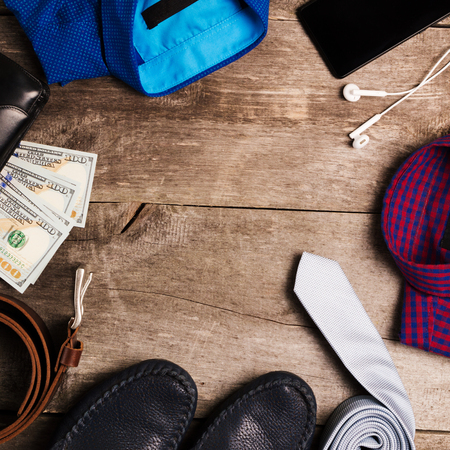 Casual mens fashion and outfits on the wooden table, flat lay, top view.の写真素材