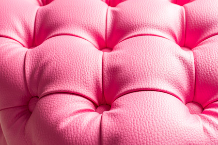 Pink pouf, furniture with decoration buttons in the home interior.の写真素材