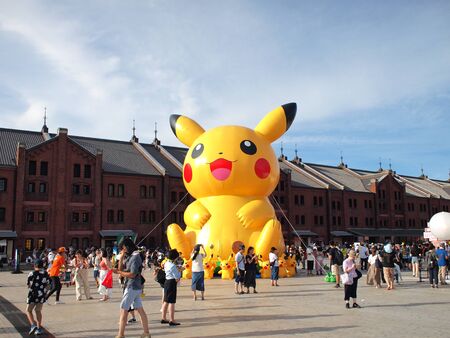 YOKOHAMA, JAPAN - August 6th, 2019: Giant Pikachu at the Pikachu Outbreak! 2019 event in Yokohama Minato Mirai area. Pikachu is a fictional creature from Pokemon, a popular video game series.のeditorial素材