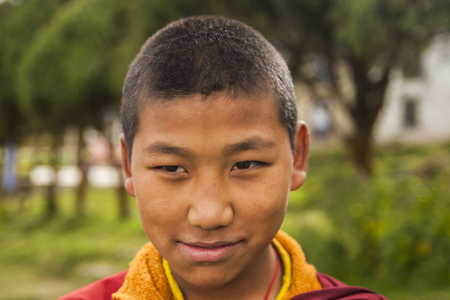 JUNBESI, NEPAL - CIRCA OCTOBER 2013: follower monks to the monastery circa October 2013 in Junbesi.のeditorial素材