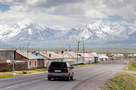 SARY-TASH, KYRGYZSTAN - CIRCA JUNE 2017: View on Sary-Tash a village and major crossroads in the Alay Valley of Osh Region, Kyrgyzstan circa June 2017 in Sary-Tash.のeditorial素材