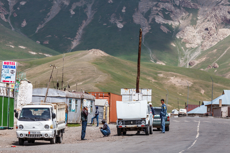 SARY-TASH, KYRGYZSTAN - CIRCA JUNE 2017: View on Sary-Tash a village and major crossroads in the Alay Valley of Osh Region, Kyrgyzstan circa June 2017 in Sary-Tash.のeditorial素材