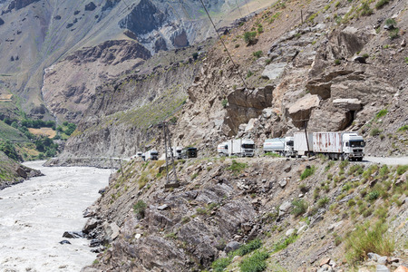 KHOROG, TAJIKISTAN - CIRCA JUNE 2017: The road from Khorog to Dushanbe along the Panj River circa June 2017 in Khorog.のeditorial素材