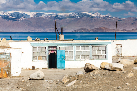 KARAKUL, TAJIKISTAN - CIRCA JUNE 2017: Beautiful view of Karakul village on Lake Karkul in Tajikistan circa June 2017 in Karakul.のeditorial素材