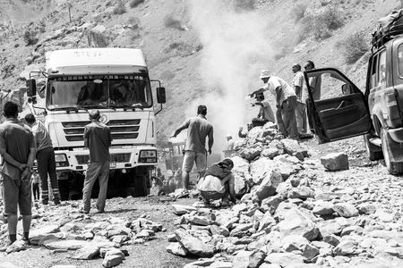 KHOROG, TAJIKISTAN - CIRCA JUNE 2017: The road from Khorog to Dushanbe along the Panj River circa June 2017 in Khorog.のeditorial素材