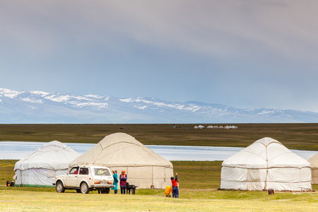 SONG KUL, KYRGYZSTAN - CIRCA JUNE 2017: View of one of the camps at Song Kul  high alpine lake in...