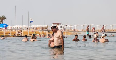 EIN BOKEK, ISRAEL - CIRCA MAY 2018: People floating in Dead Sea circa May 2018 in Ein Bokek.のeditorial素材