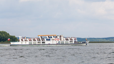 MIKOLAJKI, POLAND - CIRCA AUGUST 2020: A view of the ferry on Lake Sniardwy circa August 2020 in Mikolajki.のeditorial素材