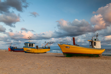 REWAL, POLAND - CIRCA AUGUST 2021: Fishing boat on the beach in Rewal circa August 2021 in Rewal.のeditorial素材
