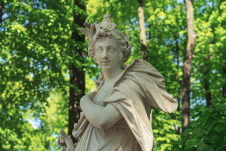 Saint Petersburg, RUSSIA - May 28, 2018: Classical sculpture composition a female  in the summer garden in St. Petersburgのeditorial素材
