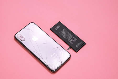 April 11, 2020, Rostov-on-Don, Russia: smartphone iPhone X of space gray color with broken back...