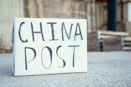 big white fox with the inscription China Post, hysteria about a new virusの写真素材